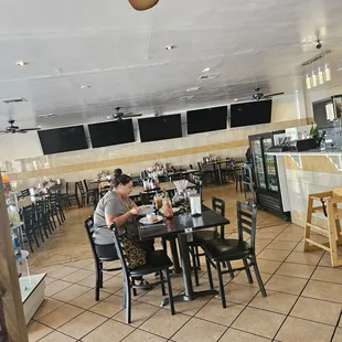 As you can see, it is very empty.  This customer arrived after I did to pick up my order. She is well into enjoying her meal.