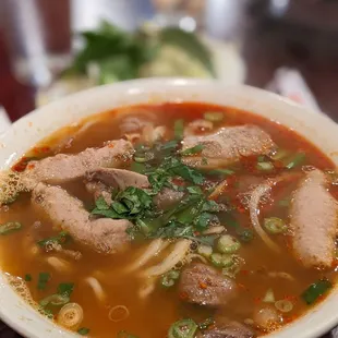 Bun bo hue with pork ribs, pork loaf, and beef