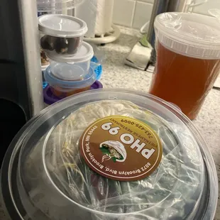 Pho, soup and ingredients all packed with care.