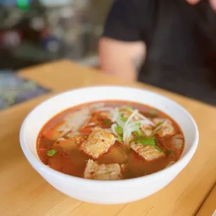 a bowl of soup on a table