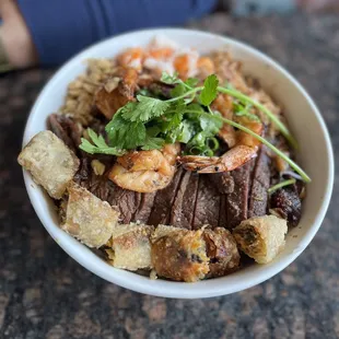 a bowl of beef and vegetables