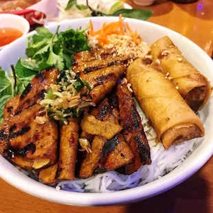 Vermicelli plate with egg rolls