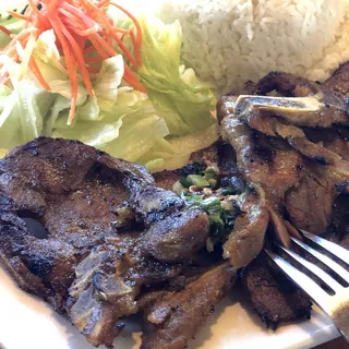 55. Charbroiled Pork Chop over Rice