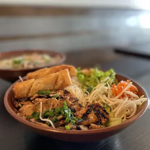 two bowls of food on a table