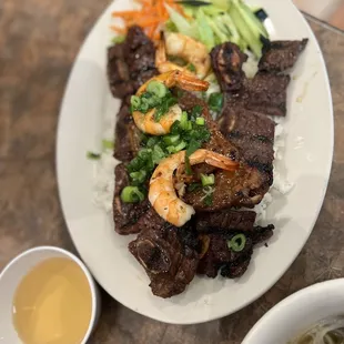 Combination rice dish with shrimp, porkchop and beef ribs