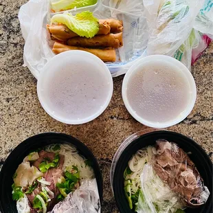 Rare steak beef noodle ( right ), Rare steak with flank, brisket .  Eggroll