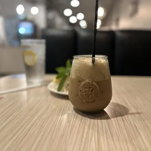 a drink with a straw in it