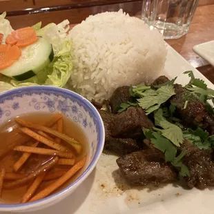 #25 Marinated beef cubes with steam rice. My favorite dish here.