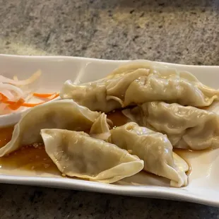 Steamed dumplings  with garlic and pork