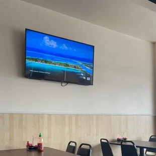 a flat screen tv mounted on the wall