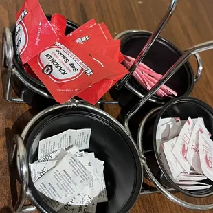 a pair of frying pans on a table