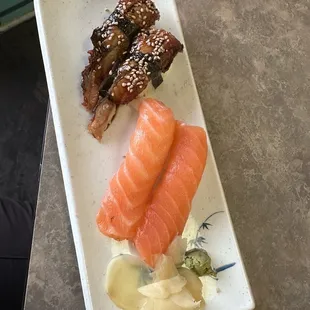 Salmon &amp; Eel sushi - note the difference in color in the salmon pieces
