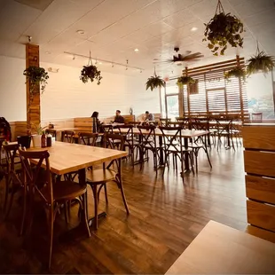 a restaurant with tables and chairs