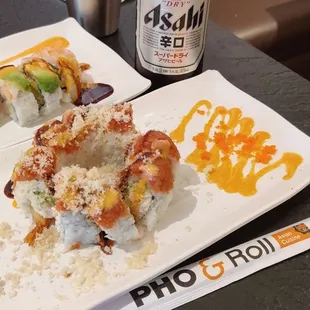 two plates of sushi and a beer