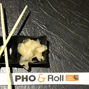 chopsticks and a bowl of food