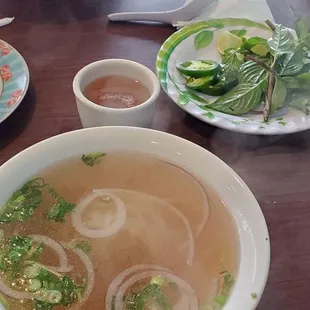 Meatless pho with chicken broth, kids grilled pork with rice.