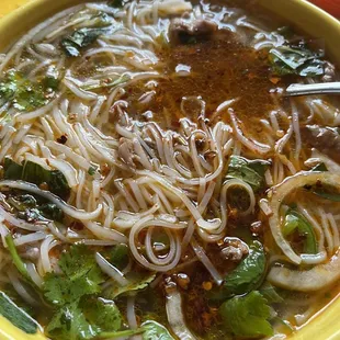 Rare steak pho after everything has been mixed in!