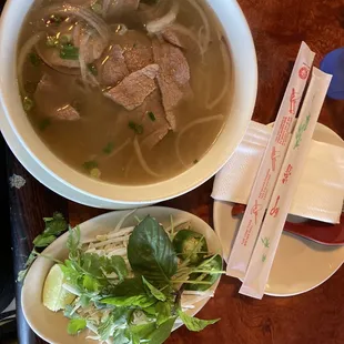 Rare beef Pho, broth was REALLY hot and delicious.