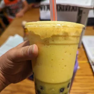 Mango/pineapple smoothie with boba