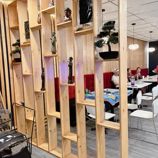 a room with wooden shelvings