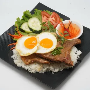 Rice with pork chop and sunny side up egg