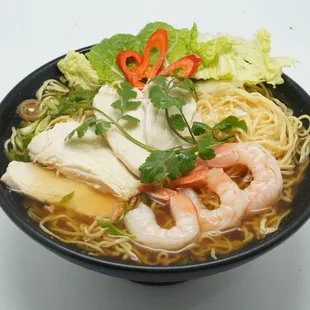 Egg noodle soup with chicken and shrimp
