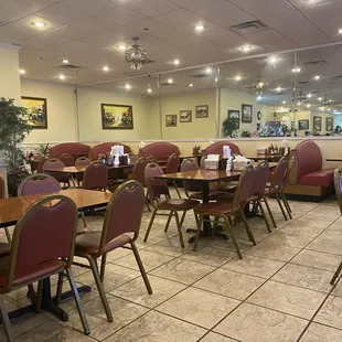 a restaurant with tables and chairs