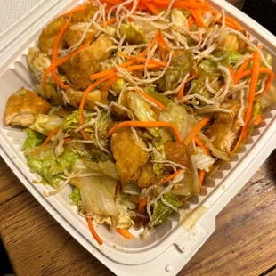a take out container of food
