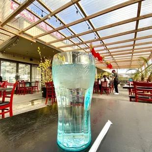 a glass of water on a table