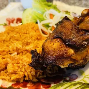 a plate of chicken and rice