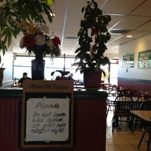 The ghetto sign inside the restaurant. Don&apos;t leave your GPS.