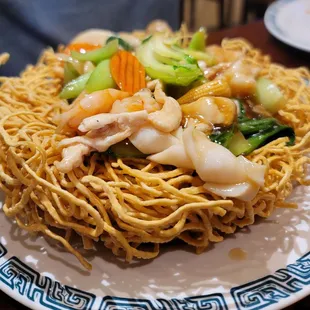 S4. Shrimp and squid crispy egg noodles (with added chicken for $1)