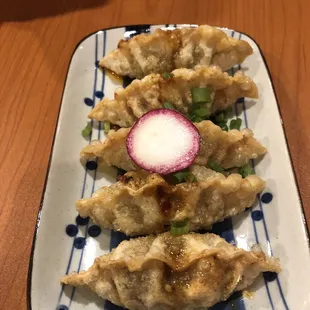 a plate of dumplings