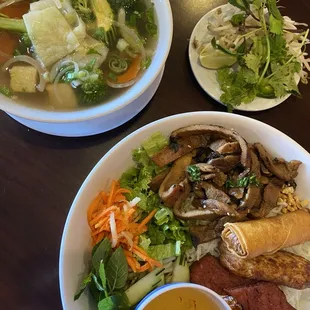 Top left corner: #38 Small veg and tofu pho. Lower right corner: #58 Vermicelli noodle bowl with all proteins