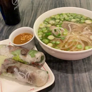 Spring rolls-pork, soda, and brisket pho.