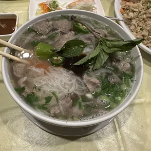 a bowl of beef pho
