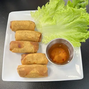 Yummy egg rolls perfectly fried.