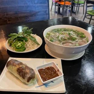 Grilled pork rolls (I ate the other one) and steak and meatball pho. Mmmmm