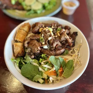 B 74. Bun Thit Nuong/Vermicelli bowl with grill pork and fried egg roll