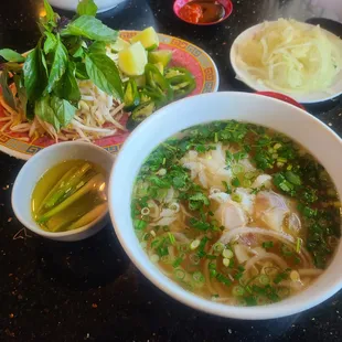 Pho w/ tendon &amp; tripe. Nuoc beo.  Sliced onions.