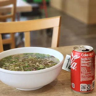 Beef pho, with Coke can for size reference.