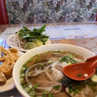 Crab Rangoons and brisket Sp12. Well-done Brisket Spicy Pho