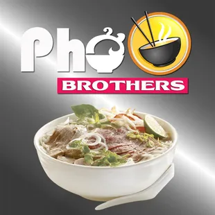 a bowl of soup with chopsticks