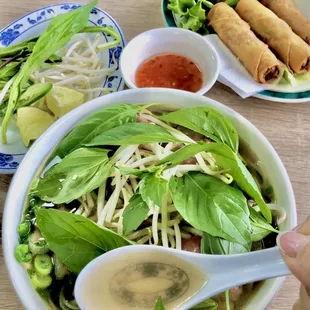 Small Bowl of Fragrant Herbs and Bone broth to warm up + veggie crispy rolls