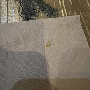 a fork, knife and napkin on a table