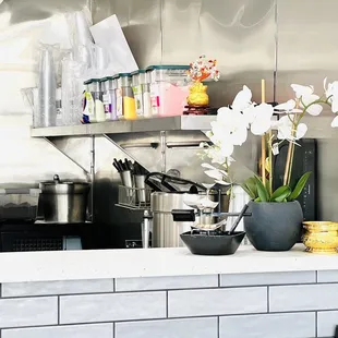 a kitchen with pots and pans