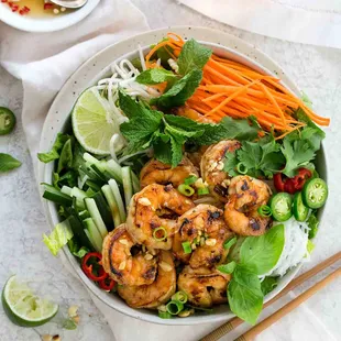 a bowl of shrimp and vegetables