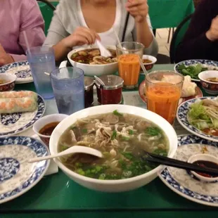 Yum! Special house Pho and fresh summer rolls with friends.