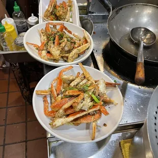 three plates of crab legs