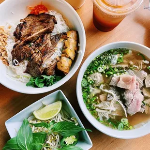 a bowl of soup, a bowl of meat, and a bowl of rice